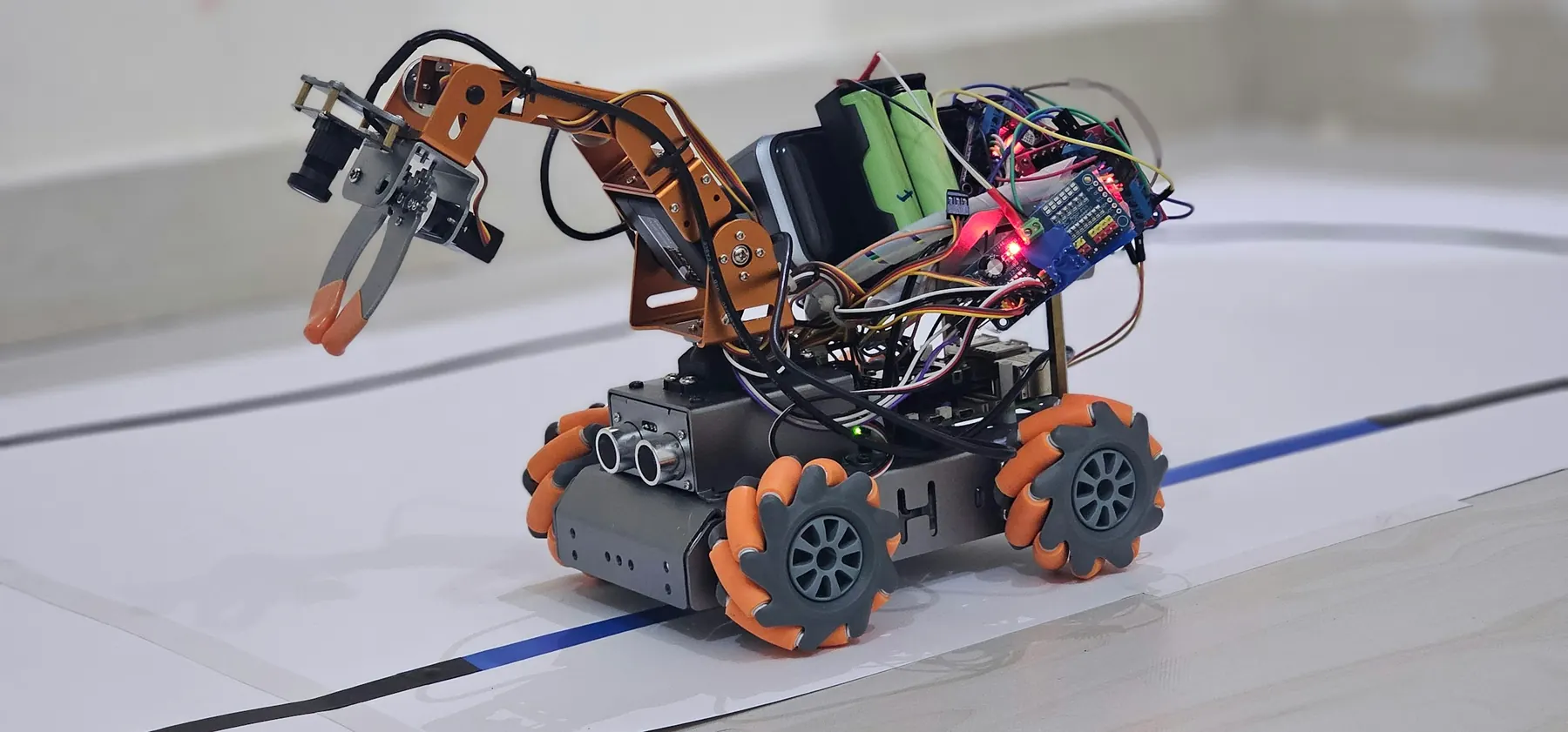 A four-joint robotic arm style build, as students make in Class 10